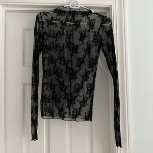 Free People Size Small black lace top.